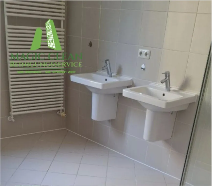 Period bathroom with two gleaming washbasins